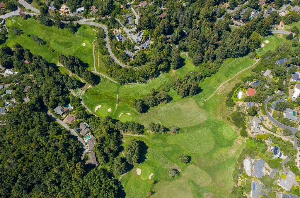 Aerial overview of Mill Valley Golf Course among the redwoods